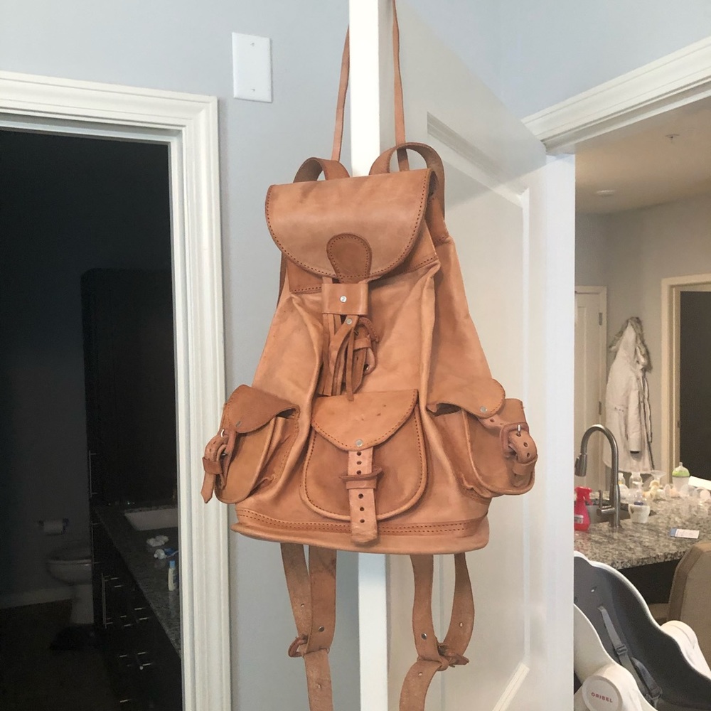 Raw leather backpack
